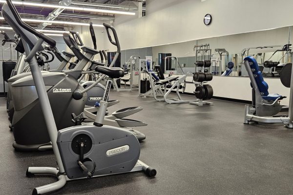 an open gym floor with both cardio equipment and strength training equipment for easy circuit training workouts in an albuquerque gym