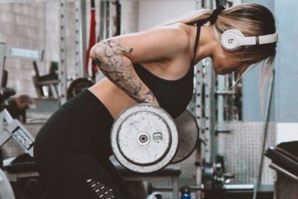 woman Strength Training with a free weights at Powerflex gyms in Albuquerque